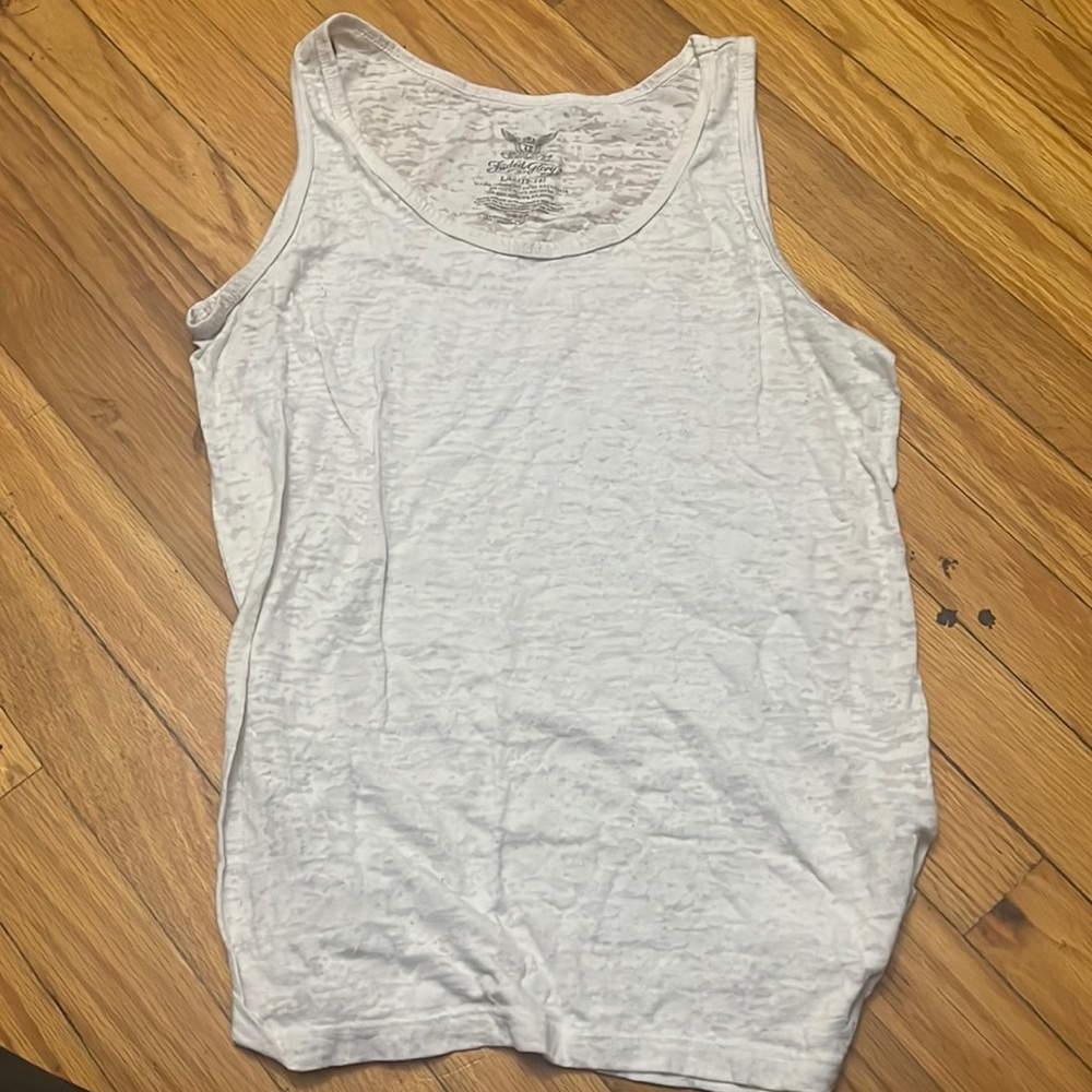 Kinda see through white tank women’s size large 12-14